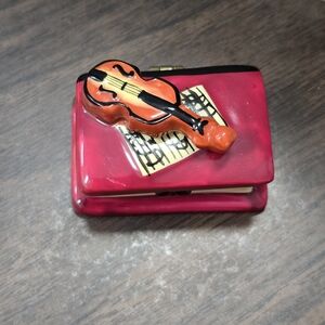 Limoges trinket box featuring a violin and music sheet.